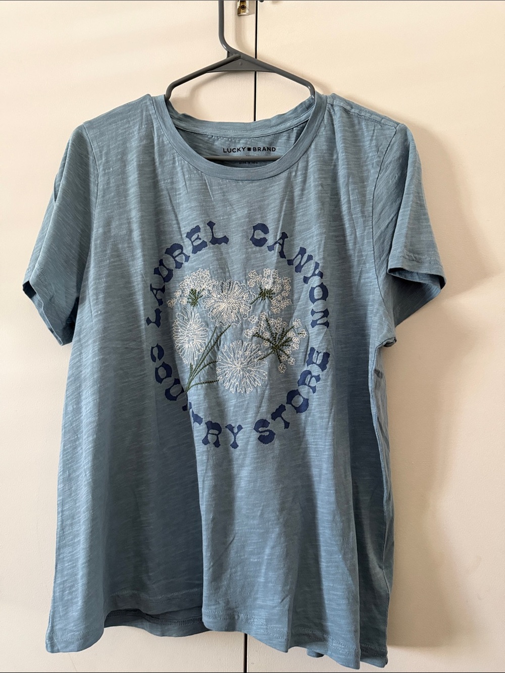 Lucky Brand Light Blue Graphic Tee with Floral Emblem